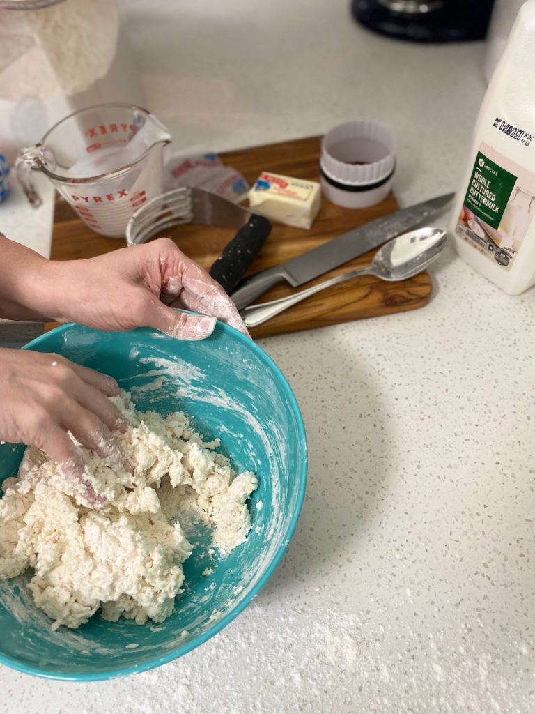 Hand mixing buttermilk biscuit dough. [buttermilk biscuits]