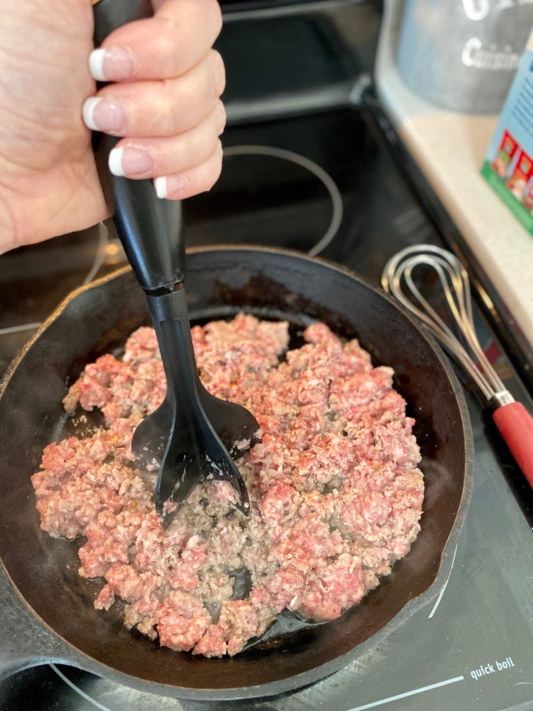 Cooking pork sausage in a cast iron skillet [Biscuits and Gravy]