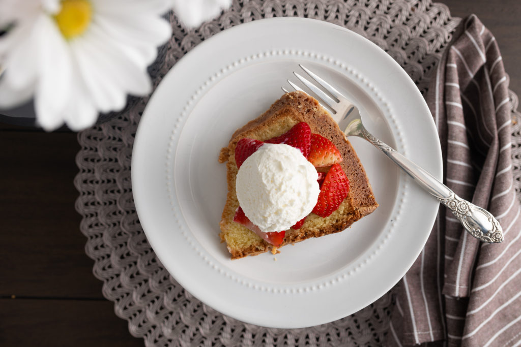 A view from the top of a slice of strawberry shortcake on a white plate. [Strawberry Shortcake]