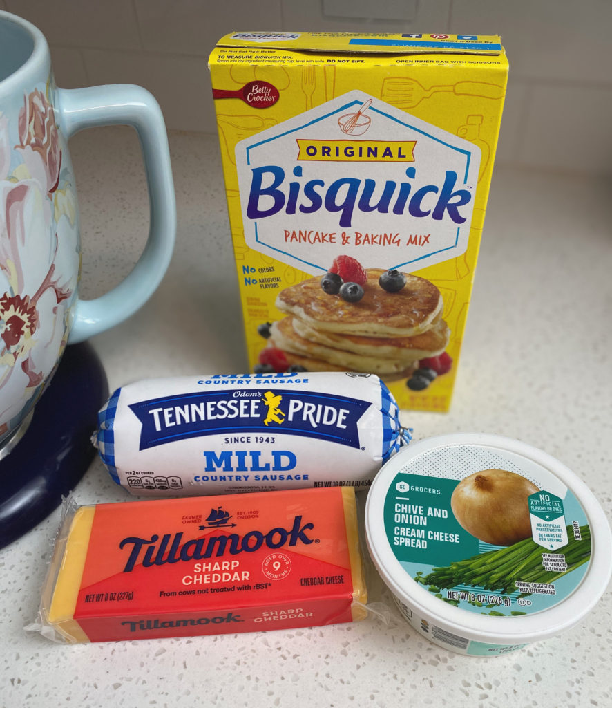 Ingredients for sausage balls: sausage, bisquick, cheese, and cream cheese