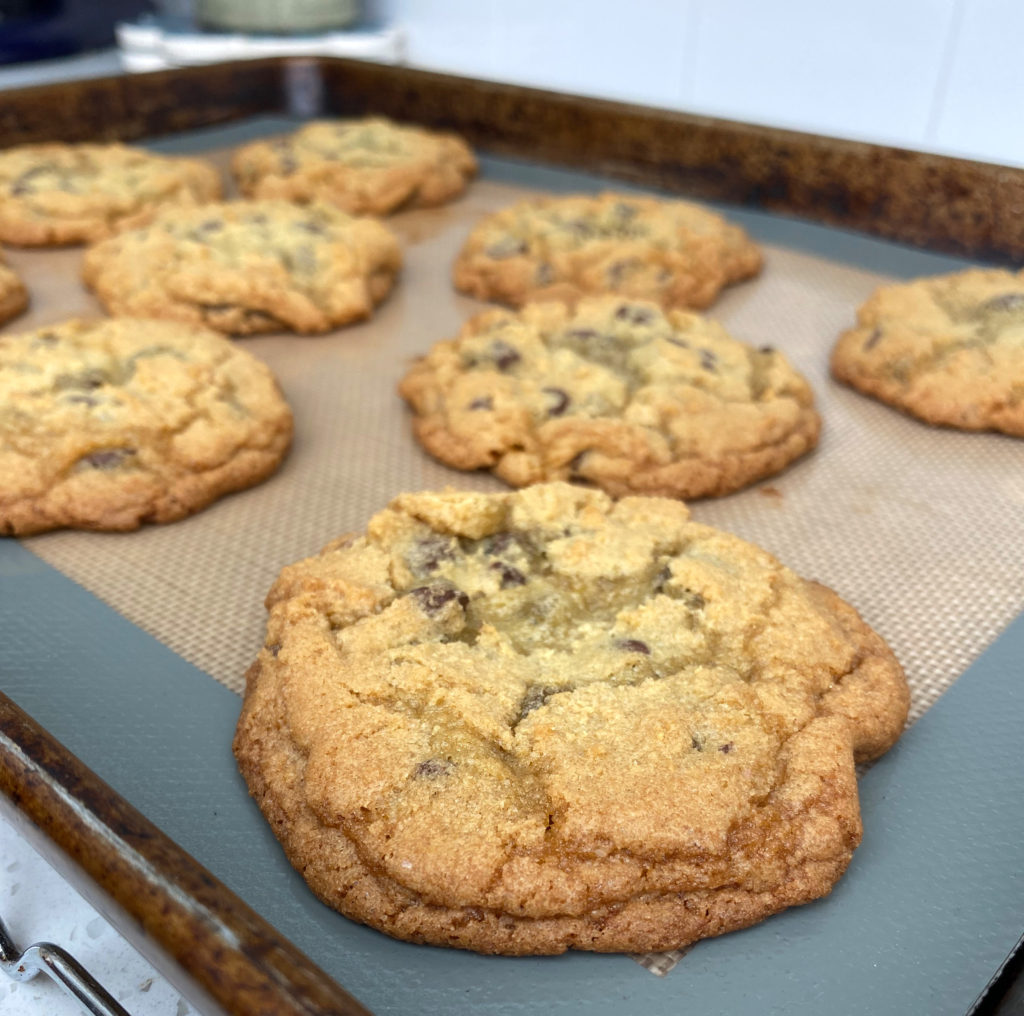 A pan of chocolate chip cookies hot from the oven